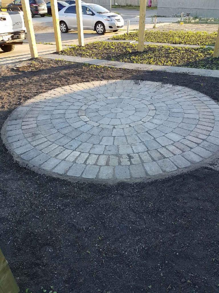 Circular paver medallion feature in entry area